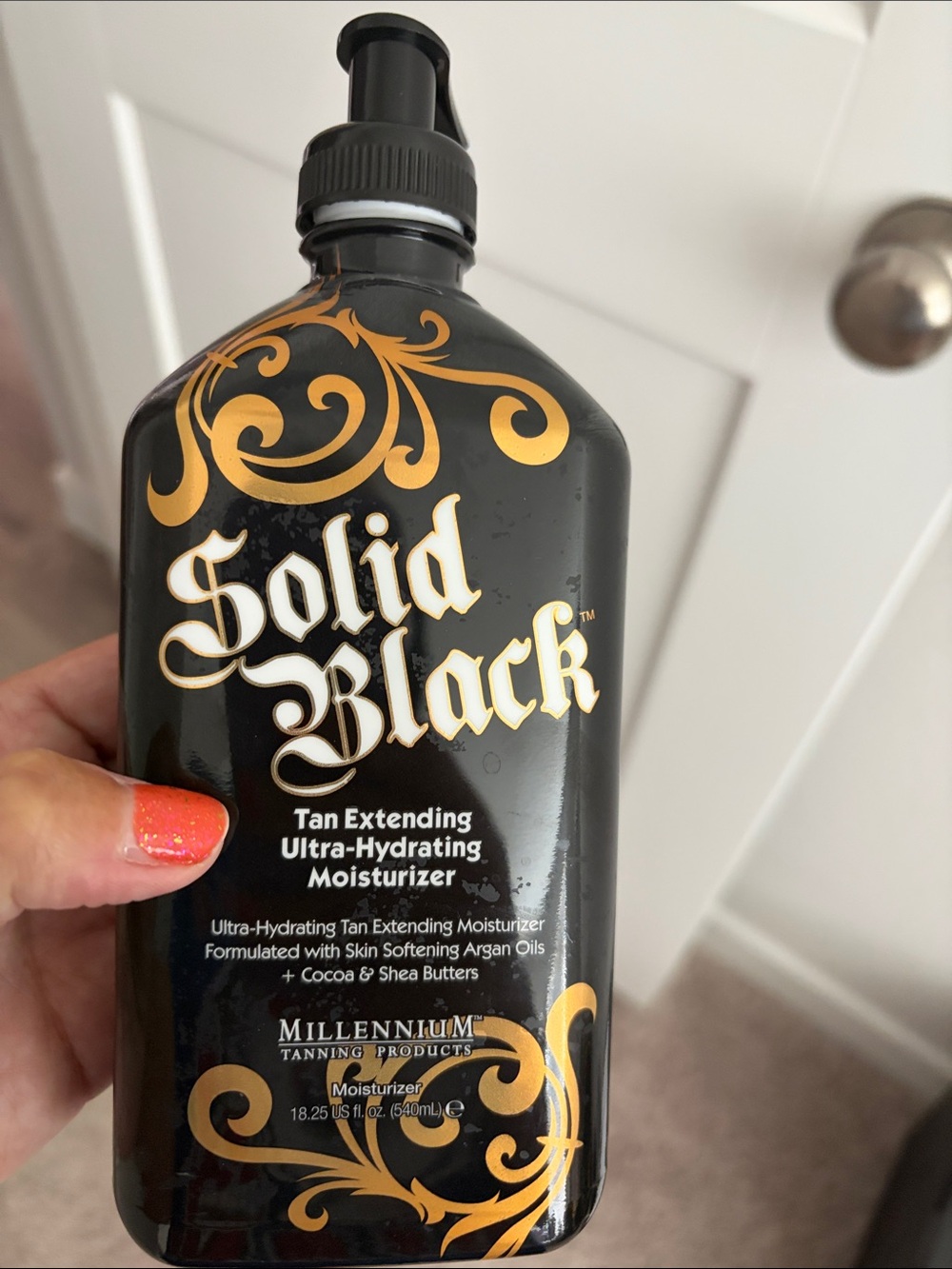 Solid Black Tan Extending Ultra-Hydrating Moisturizer - Black